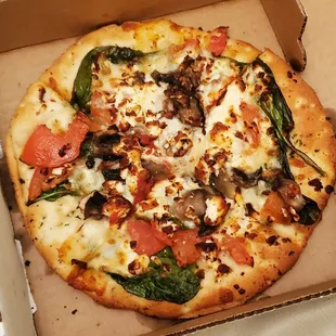 Cute little baby spinach feta pizza! Tasted as great as it looks.
