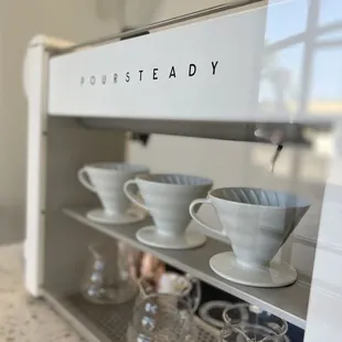 a close up of a coffee roaster