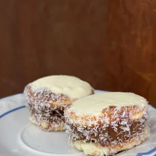 two pastries on a plate on a table