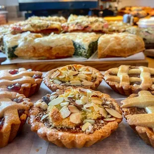 a variety of pies on a table