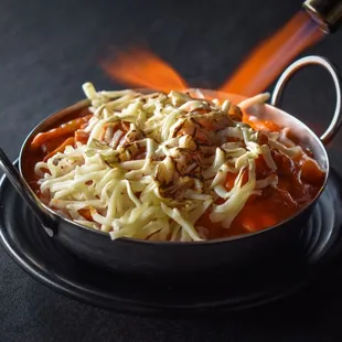 Tableside torched Mozzarella Cheese Rose Tteokbokki