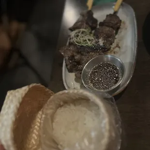 Beef skewers and sticky rice