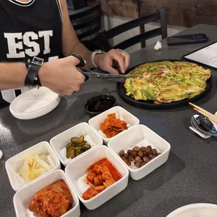 Seafood pancake and side dishes