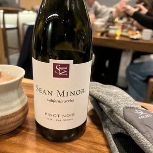 a bottle of wine on a table