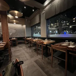 a restaurant with tables and chairs