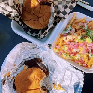 a plate of fries and a tray of fries