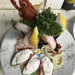 a plate of seafood and clams