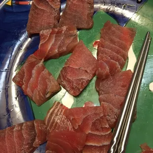 a plate of raw tuna