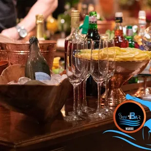 a man preparing a drink at the bar