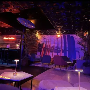 lounge area with bar and lounge chairs