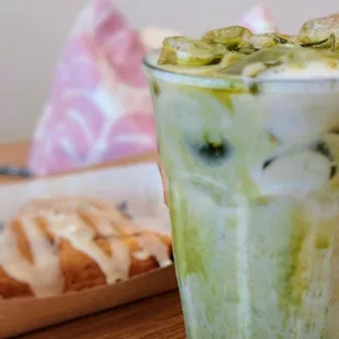 Delicious strawberry matcha latte paired with a strawberry scone