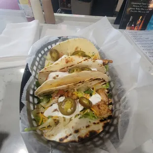 Two grouper/salmon tacos and a shrimp. Very underwhelming in taste.