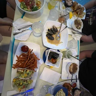 Tacos, ahi tuna bowl, coconut shrimp, fish and chips