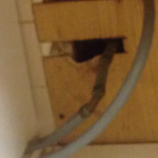 Piping and holes under sink