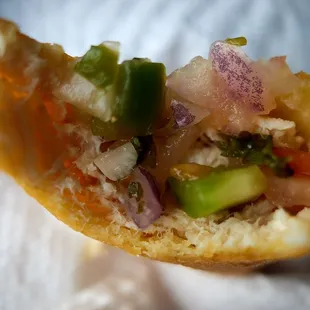 Chicken empanada (interior plus fresh pico de gallo)