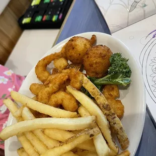 Fried shrimp, hush puppies, and fries.