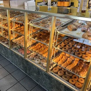 a display of various types of doughnuts