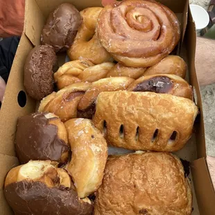 Chocolate chocolate, twisted donut, chocolate croissant, glazed donut, chocolate and custard cream donut, etc