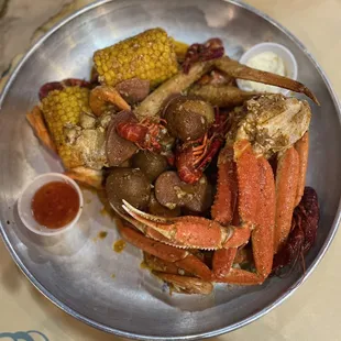 Pick 2 Snow Crab Leg Combo 2 1/2 head off shrimp 1/2 crawfish Topping-surfing special Heat-medium