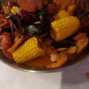 Seafood boil crayfish shrimp heads off black mussels. We added sausage.