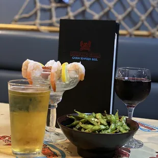 a plate of food and a glass of wine