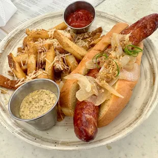 Grilled kukui sausage with garlic fries.