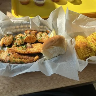 Grilled Catfish, Grilled Shrimp, Dinner Roll, side of corn (2 Fish Combo)