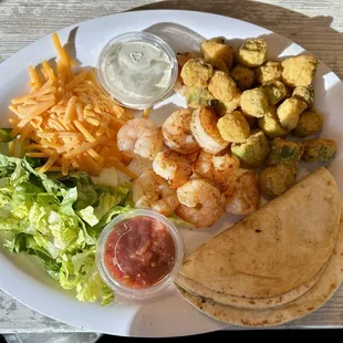 Shrimp tacos with fried okra.