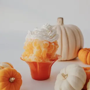 pumpkins and a cupcake