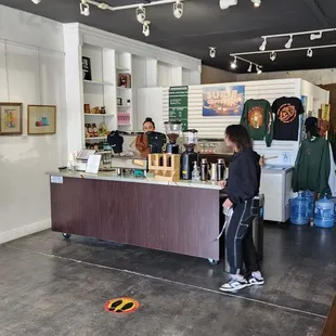 a man standing in front of a counter