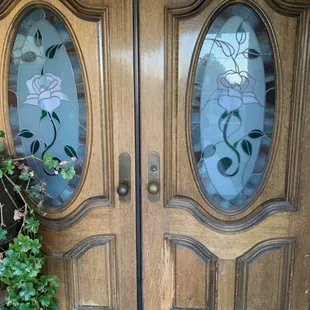 A door before paint and restoration and repaired and made white