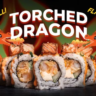 Our newest and most popular roll! Shrimp tempura and cream cheese inside, topped with torched salmon, spicy mayo, and sweet soy sauce. Yum!!