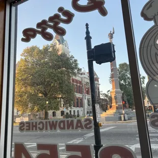 the reflection of the building across the street