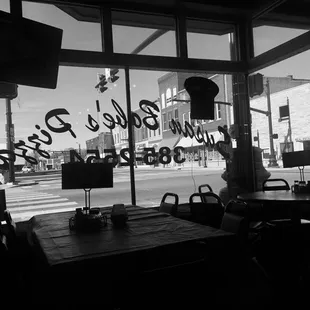 a black and white photo of a restaurant