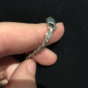 Jagged edge of a chain Susan Eisen "repaired"