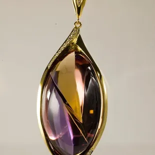 Stunning Munsteiner cut Ametrine Pendant.