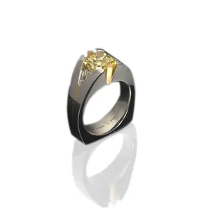 Natural Fancy Vivid Yellow Diamond 3.02 Carats, accented with 2 Trillion Diamonds = 1.10 Carats. 18 Kt...