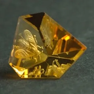 Citrine with Bee, carved by Hans Pauly, Germany.  See us for our exquisite collection of gemstones.