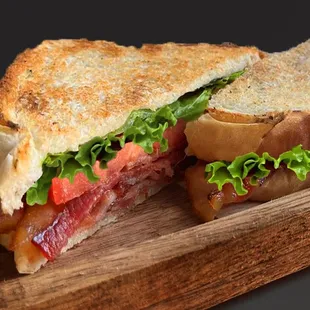 a sandwich on a cutting board