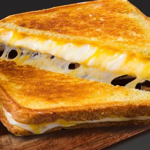 a grilled cheese sandwich with pickles