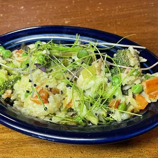 Vegetarian Coconut stir fry on Saffron rice. Protein additions available.