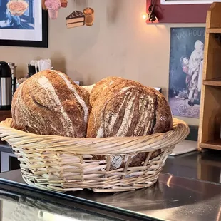 a basket of bread on a counter