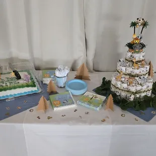 a table with a cake and decorations