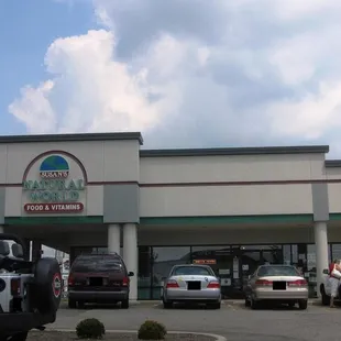 cars parked in front of the store