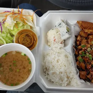 Chicken Teriyaki lunch box with rice, 2 pc california roll, dumpling, potato side dish, house salad and miso soup