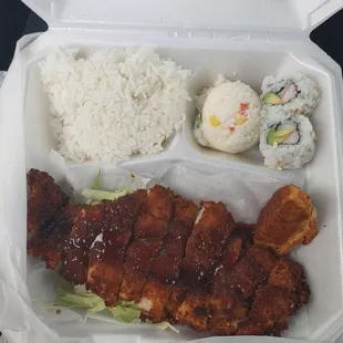 Chicken Katsu lunch box with rice, 2 pc california roll, dumpling, side salad, miso soup and potato side