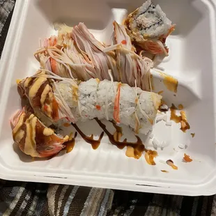 a white styrofoam container filled with food