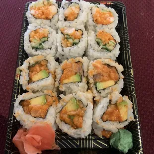Spicy salmon roll with avocado and crunchy shrimp roll