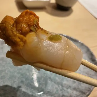 Scallop with uni on top