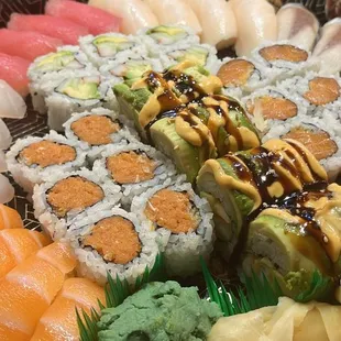 a variety of sushi in a bowl